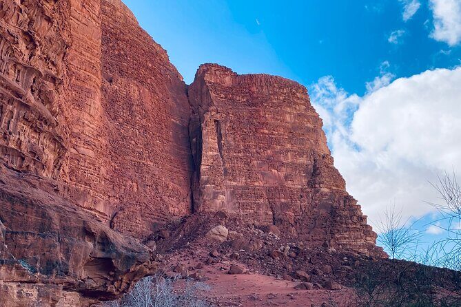 Explore Wadi Rum: Jeep Tour, Bed and Breakfast, and Dinner - Al-Khazali: Nabataean inscriptions and natural mandars