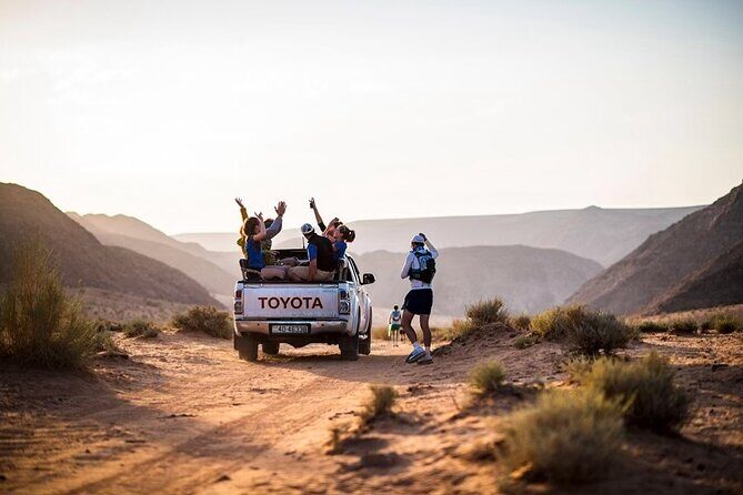 Full Day Jeep Tour with Overnight in Bedouin Camp - Stop 4: Red Sand Dunes, Movies, and Time for Sandboarding