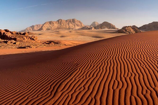 Jeep Tour in Wadi Rum with Professional Guide (Full day) - Sunset over Wadi Rum mountains: plan for the light change