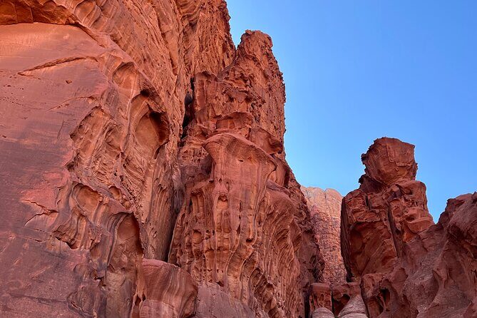 Private 1 Day Wadi Rum Desert Tour - Sandboarding and mountain-slope moments (fun, but plan for effort)