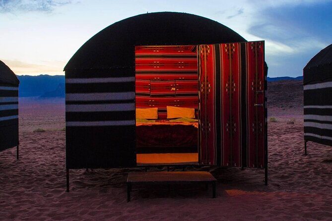 Private 1 Day Wadi Rum Desert Tour - The bivouac experience: campfire sunset, on-site dinner, and sleeping on a mattress